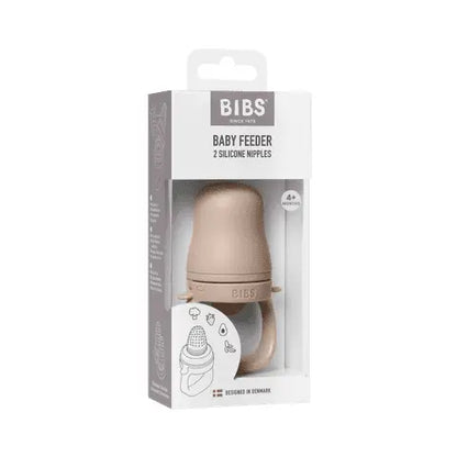 Beige silikon baby feeder med to smokker og håndtak i eske merket bibs for baby utforske fast føde matsmokk blush