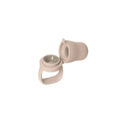 Beige silikon øreproppetui matsmokk blush med sirkulært åpning og integrert håndtak, ideell for baby utforske