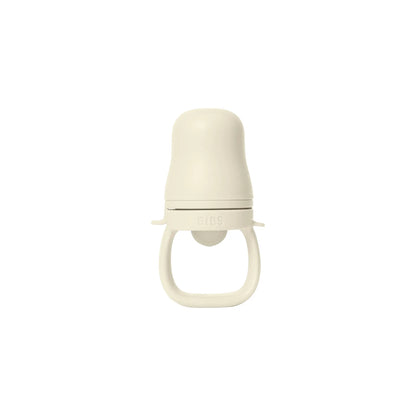 Cream-colored minimalist silicone baby feeder matsmokk ivory with rounded top and handle for baby utforske fast føde